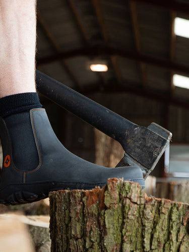Gaucho Ninja's Barefoot Safety Chelsea Boots featuring a sleek, black microfiber micro Nobuk upper, robust Full Certification Pending CSA F2413-24 safety standards, anti-slip Diamond Grip soles resistant to oil and fuel, extra-wide toe box for natural toe splay, lightweight fiberglass toe cap, anti-puncture insoles, and flexible design. Handmade in Portugal with sustainable practices, these barefoot safety Chelsea boots combine premium craftsmanship, safety, and comfort for professionals needing PPE