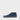 Inner side of a navy blue suede chukka boot, flat sole with leather midsole and dark rubber tread