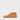 Inner side of a tan suede chukka boot, flat sole with tan leather midsole and dark rubber tread